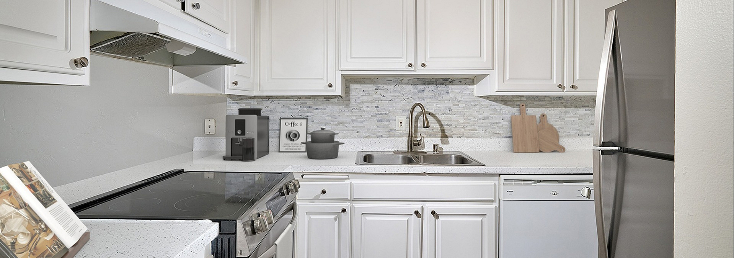 Kitchen with Stainless steel appliances and backsplash