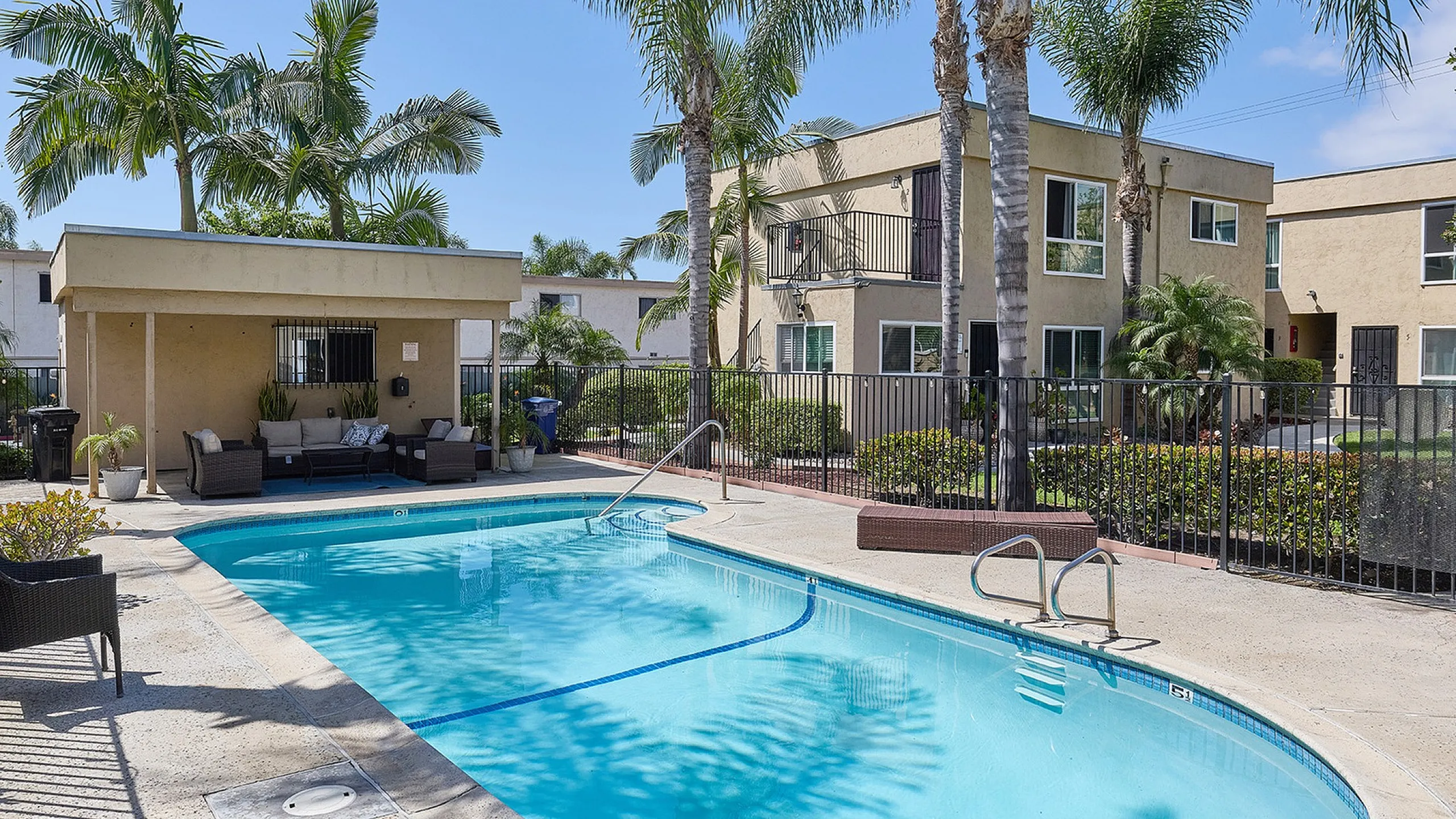 pool with lounge seating