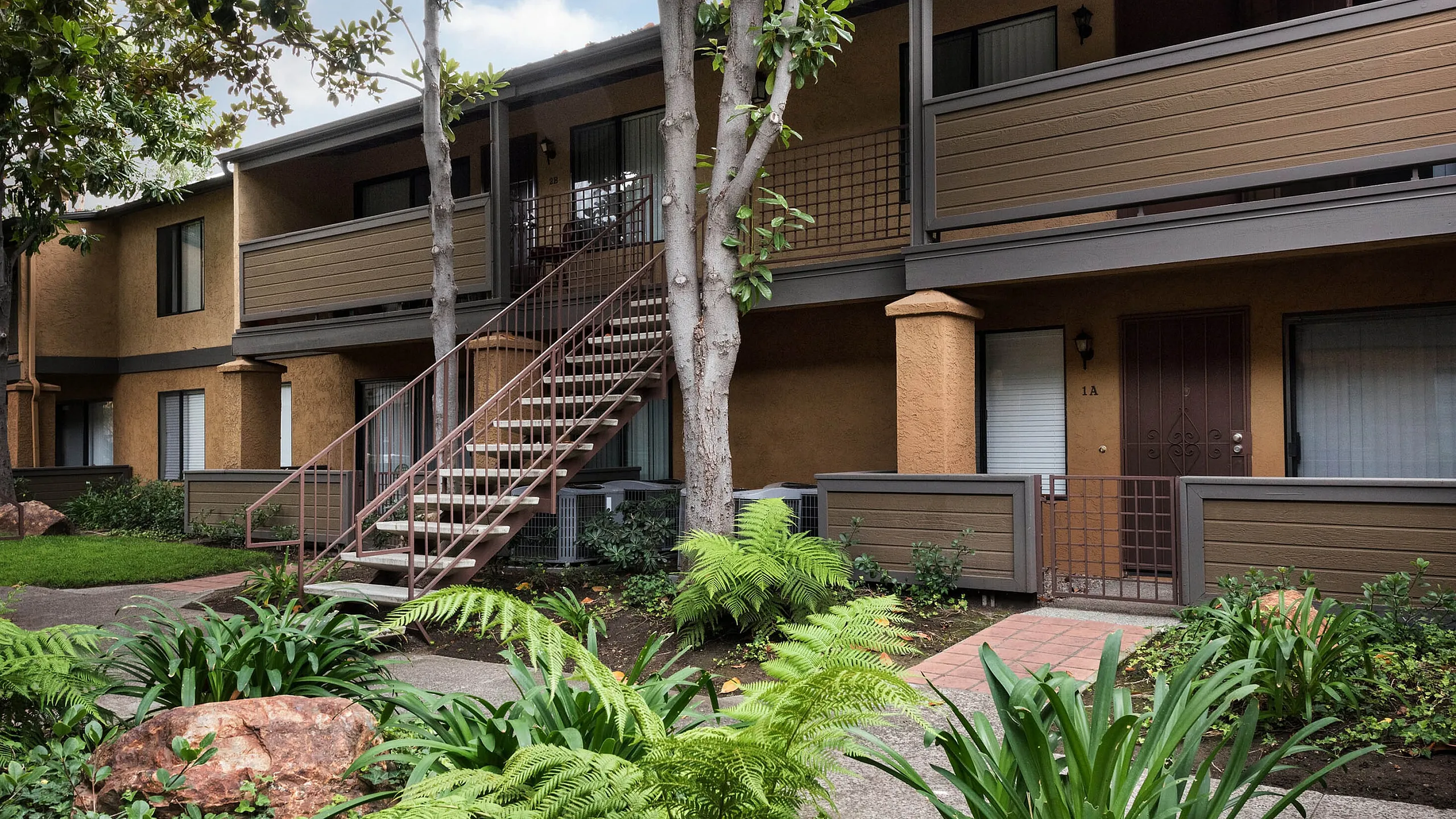 Apartment exterior with private balconies at Elan - Scripps Terrace