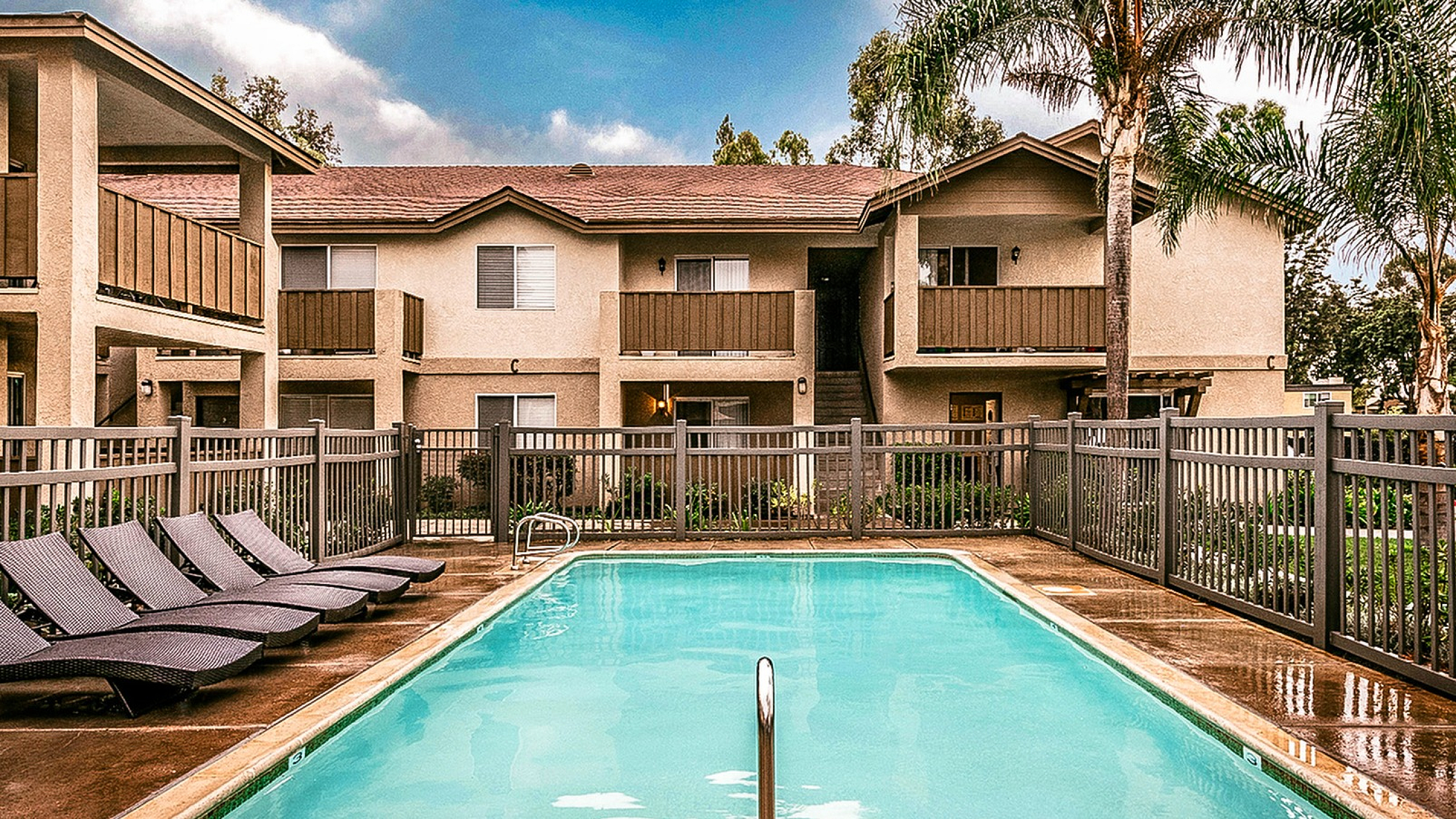 Resort-style lounging by the refreshing swimming pool at Elan - poway hills.
