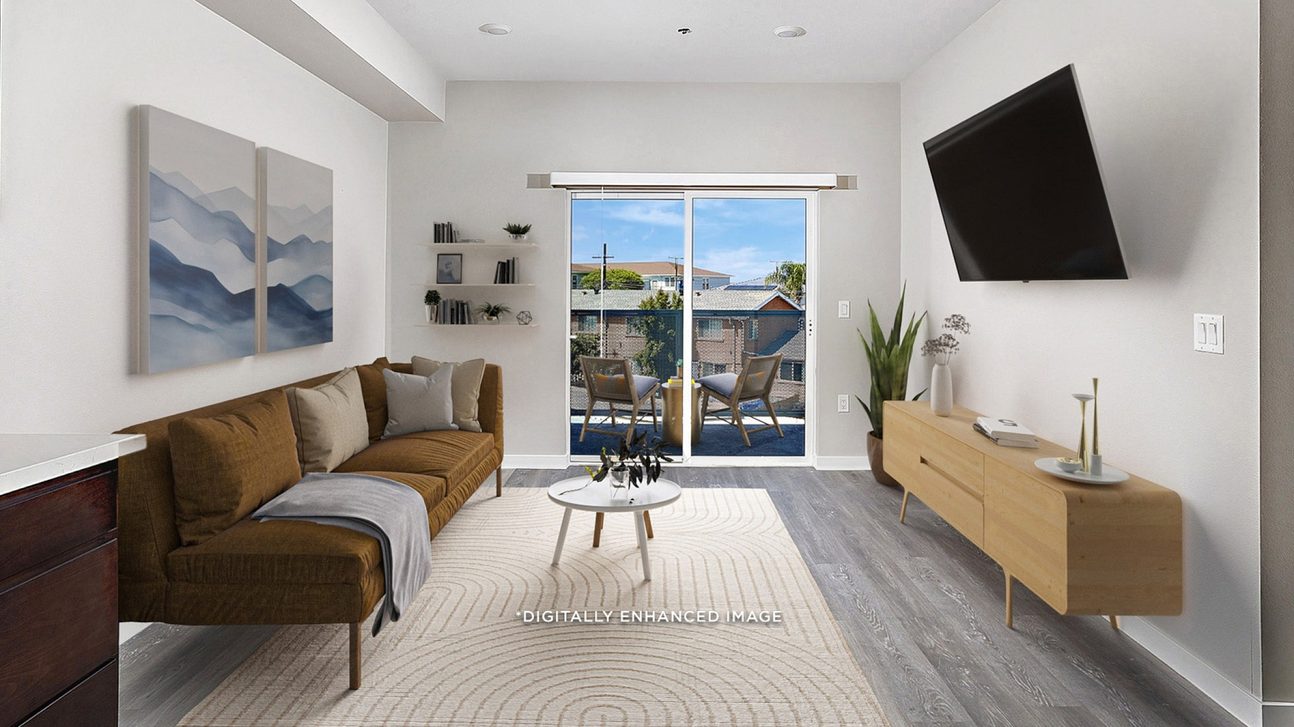 Virtually staged living room with luxury vinyl plank flooring and a balcony