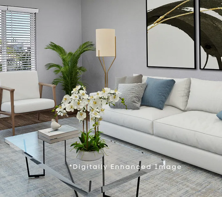 virtually staged living room with chairs and couch and glass coffee table