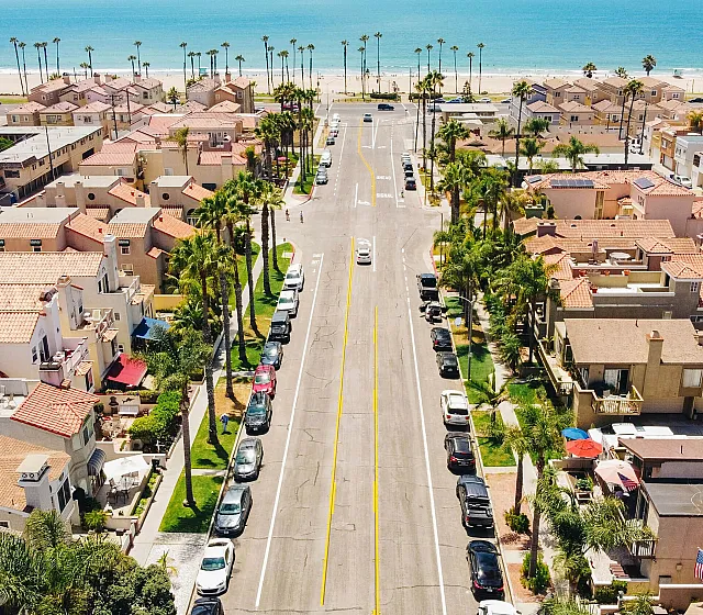 aerial view of huntington beach coastline and homes near the beach