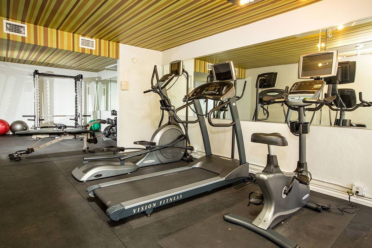 community fitness center with treadmill and stationery bikes at Solaris at The Biltmore