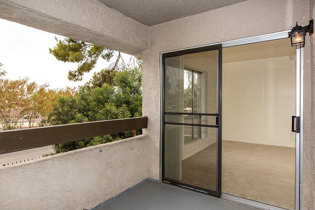 balcony with glass sliding doors at Bridge Lane