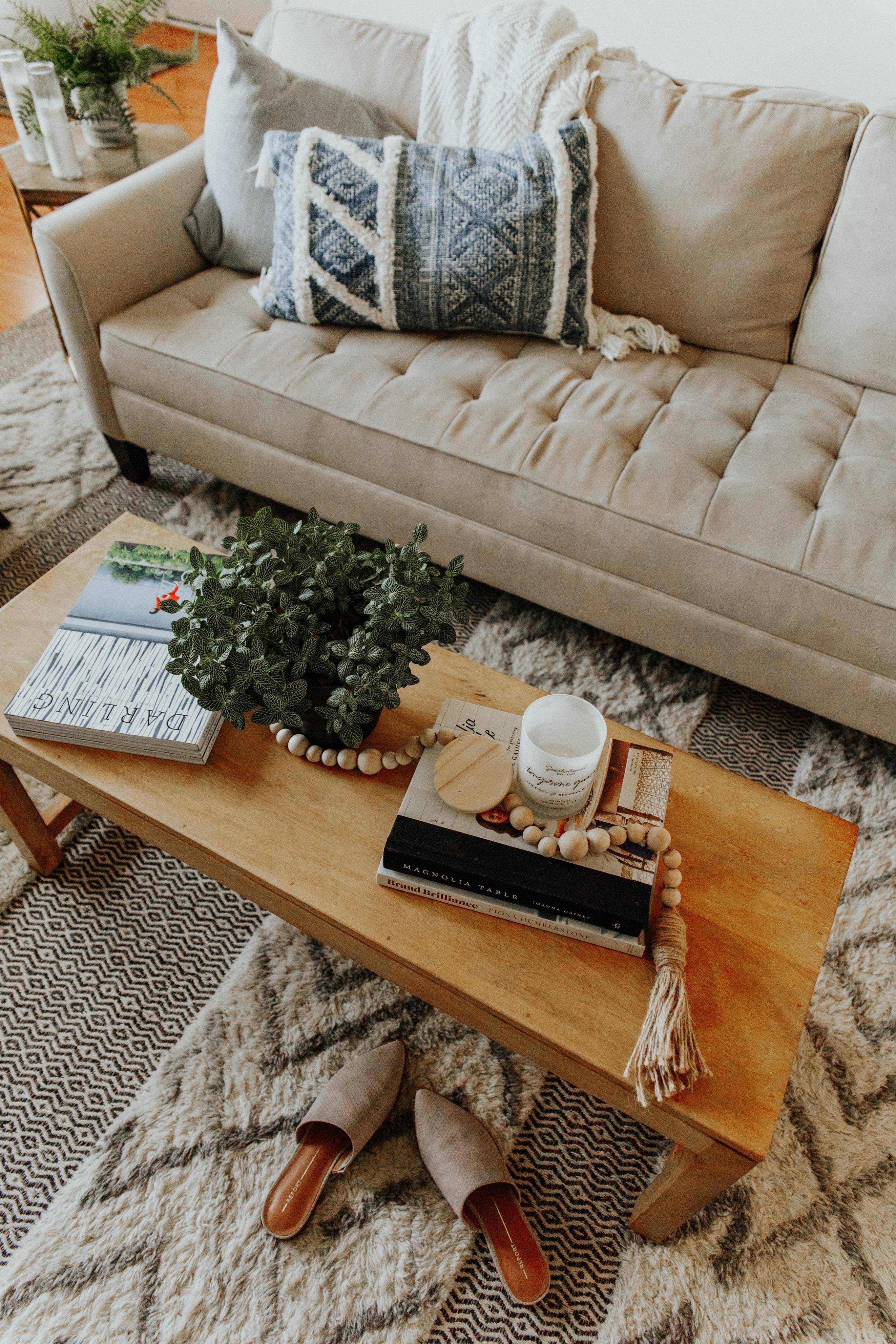 livingroom - close up of beige sofa and coffee table with decorative items