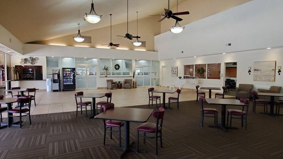 rec center with tables and chairs at orchard mesa