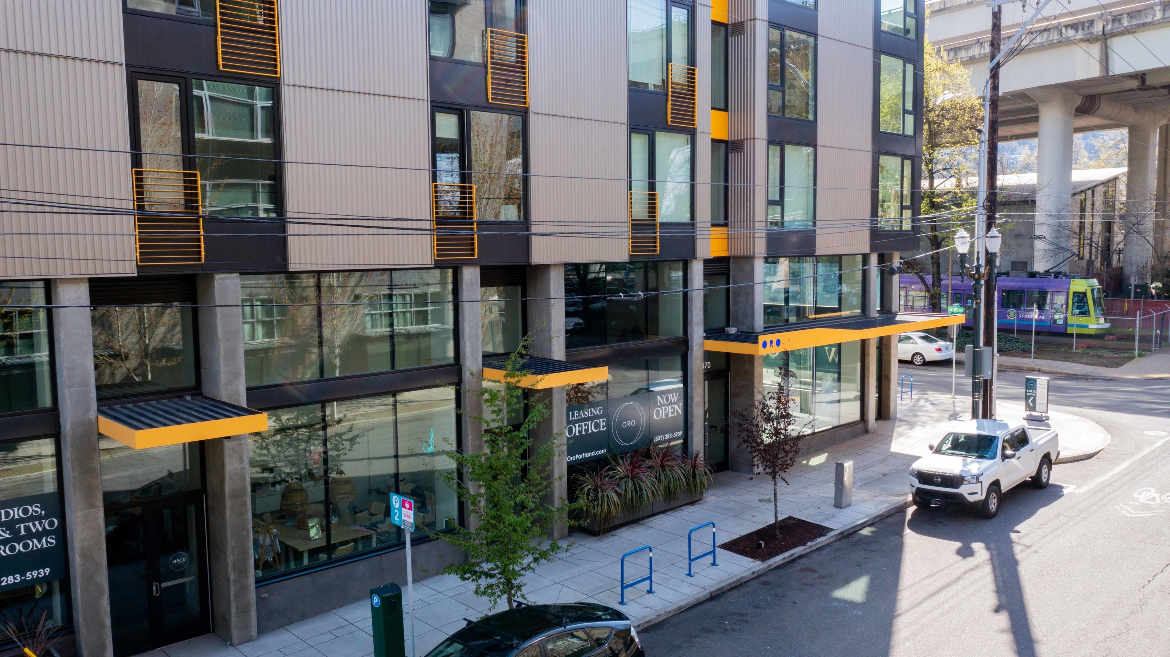 drone view of entrance to oro apartments