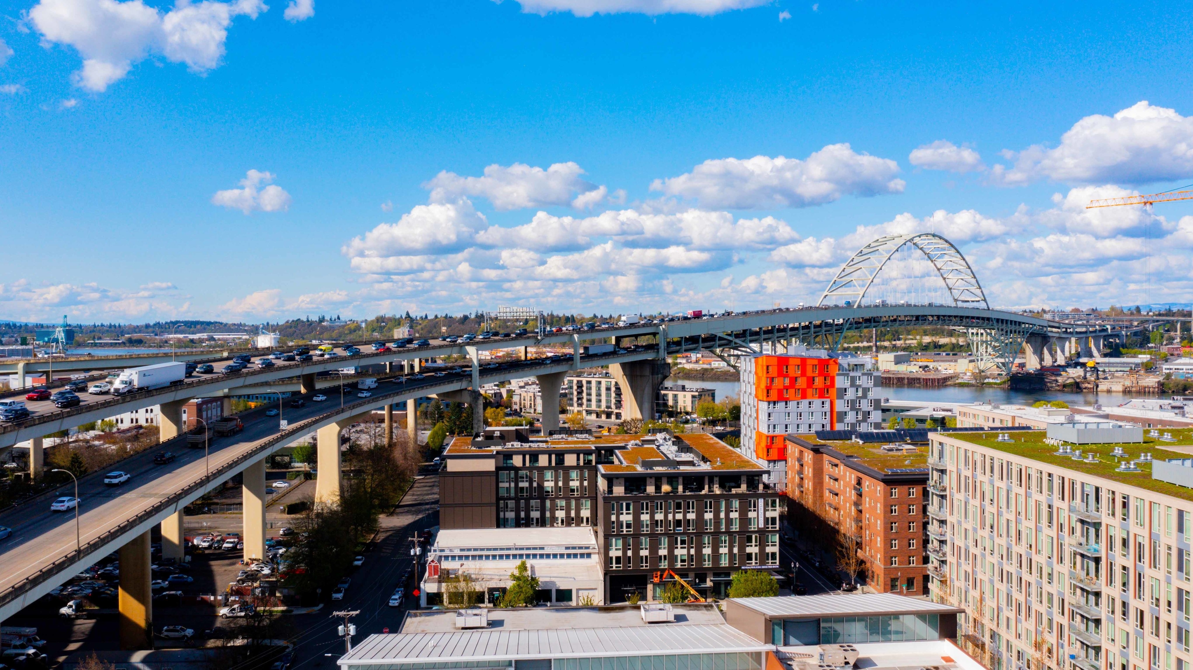 views of city from the rooftop terrace at oro apartments