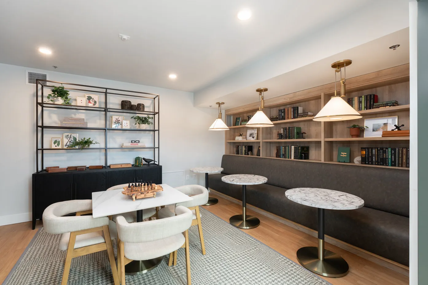resident lounge with library and seating area