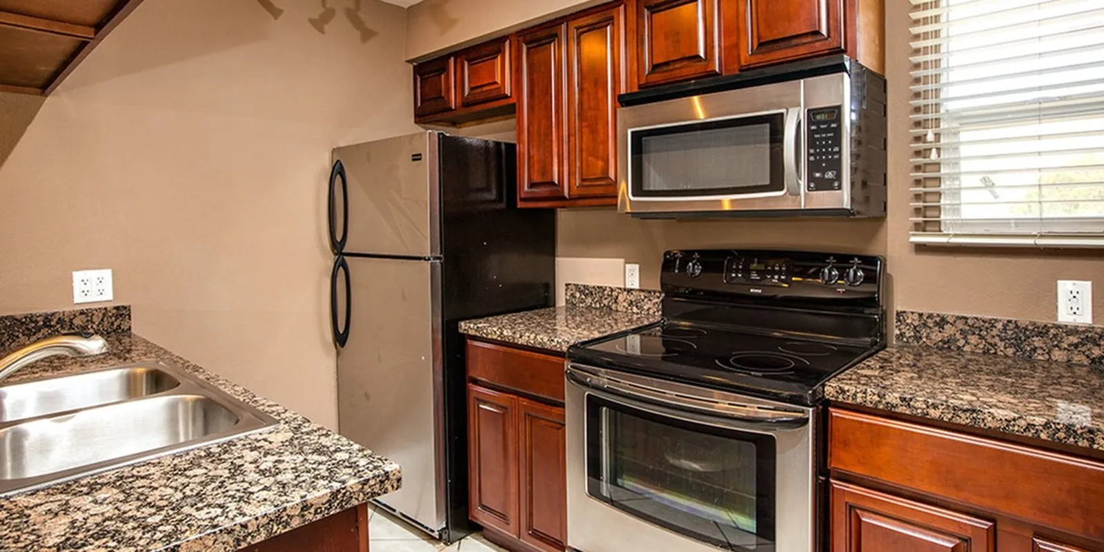 kitchen with stainless steel appliances at solaris at the Biltmore