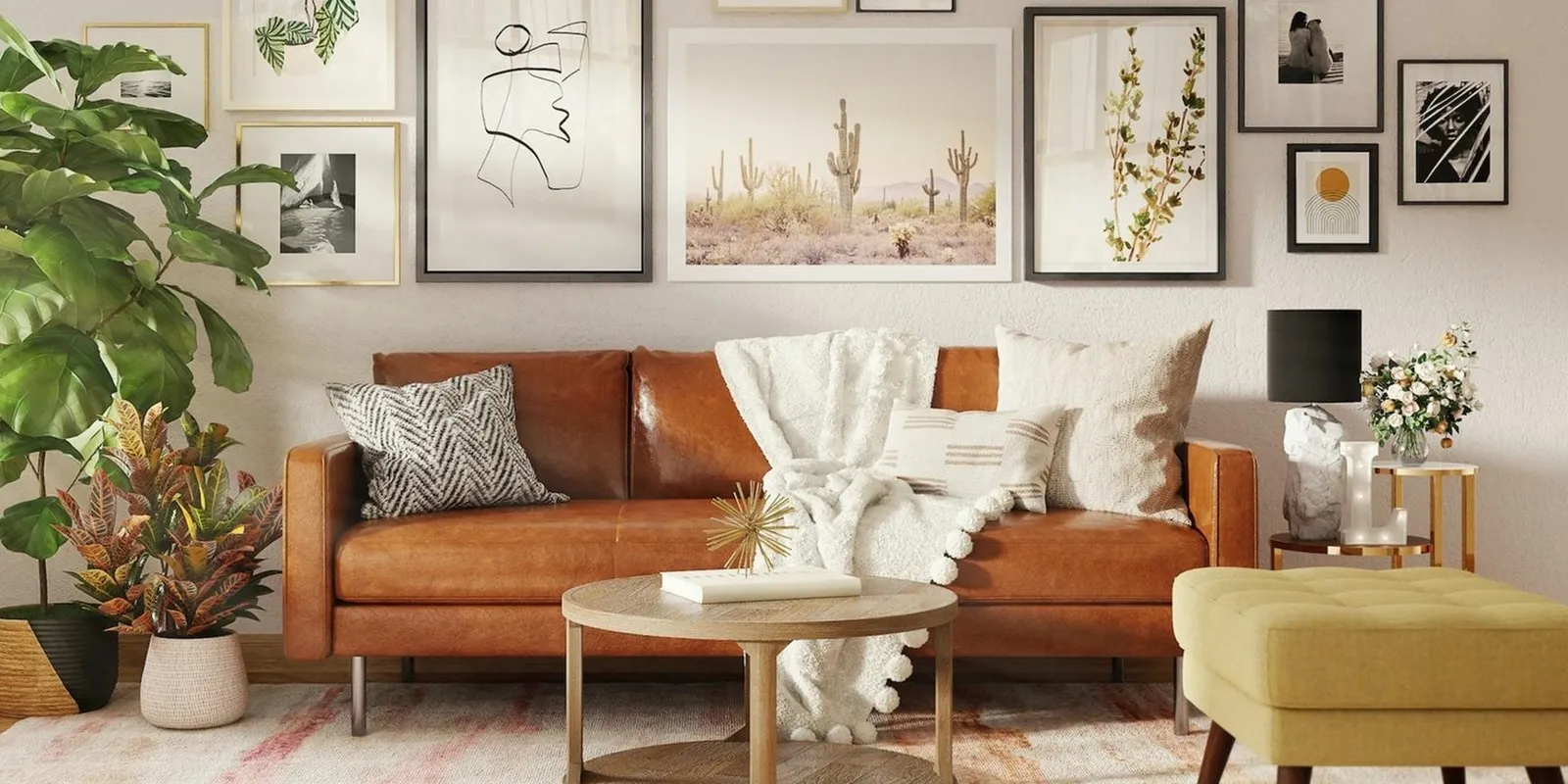 brown leather sofa with many art frames hanging behind