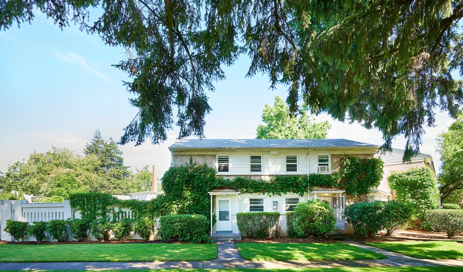 Exterior image of Apartment Building with ample grass area