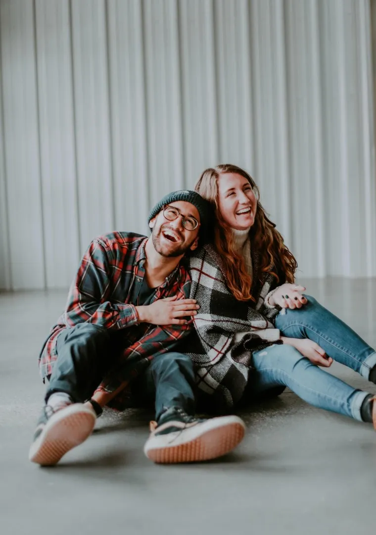 couple sitting and laughing