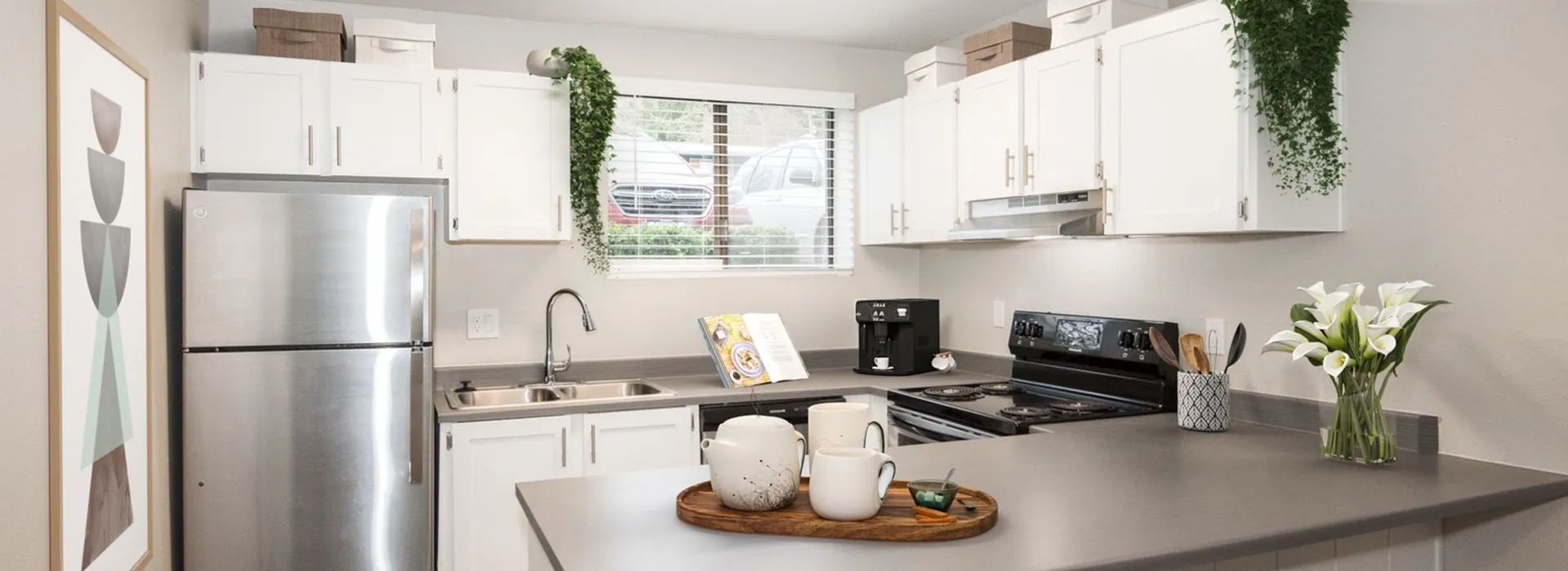 Staged kitchen with stainless steel appliances