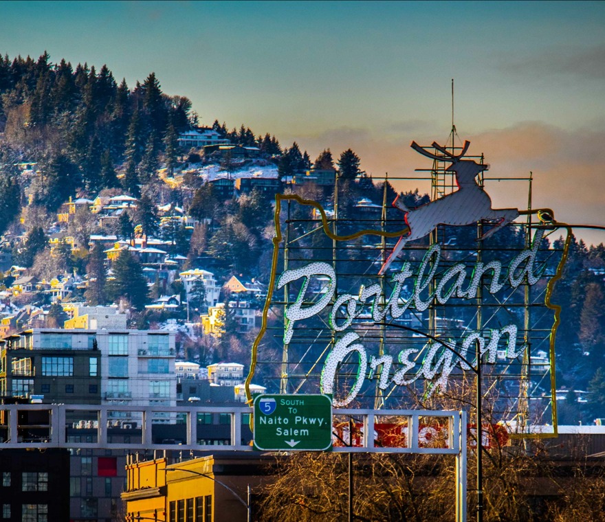 portlan oregon sign and mountain in the back