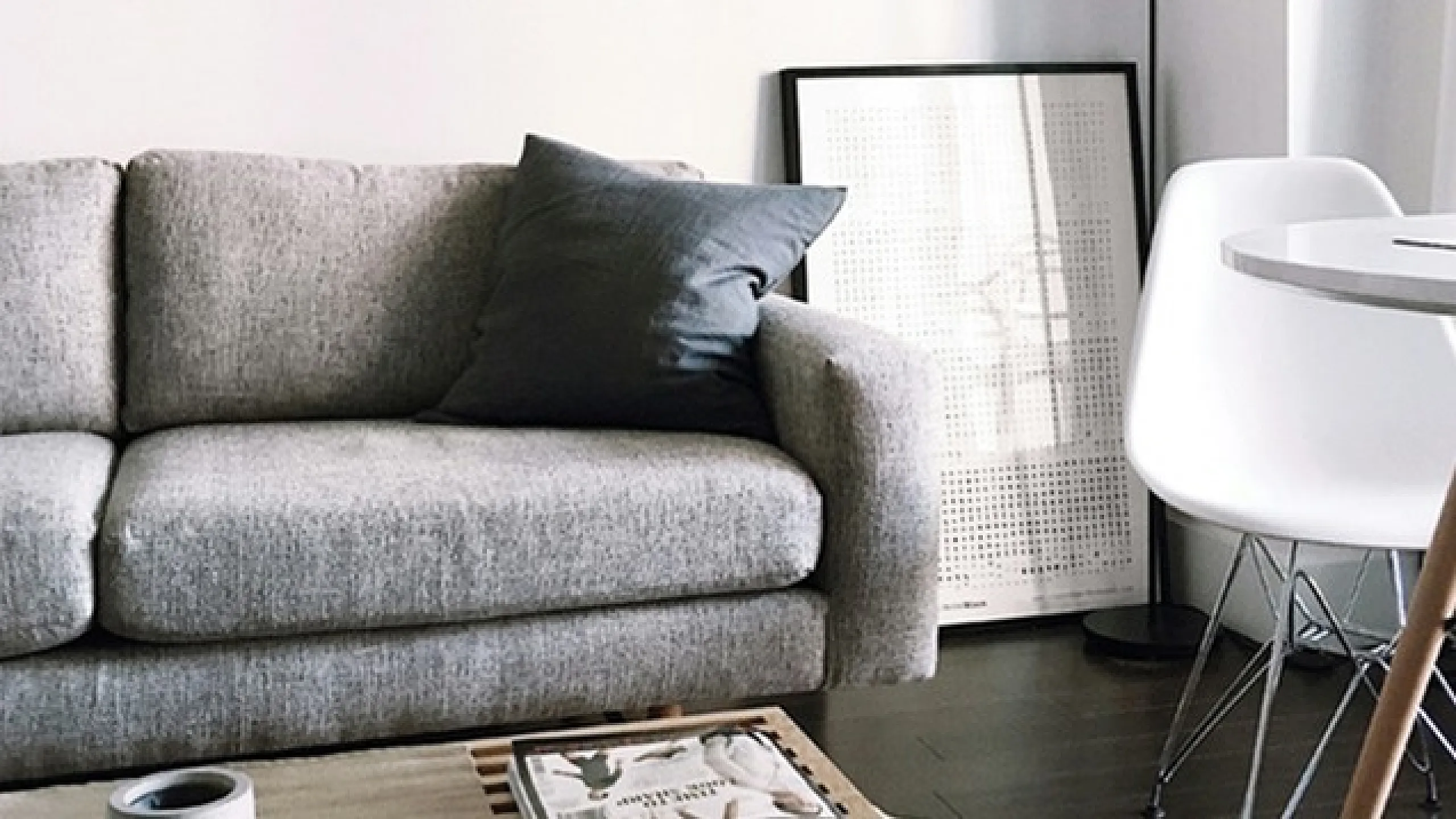 grey sofa with wooden coffee table
