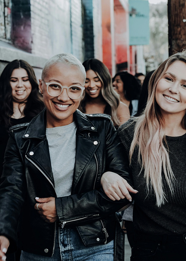 group of friends walking down the street