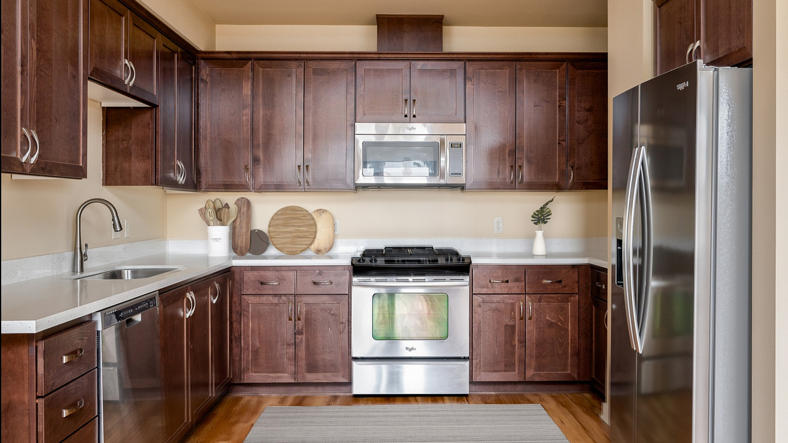kitchen with Stainless Steel appliances and granite countertops at the meridian apartments