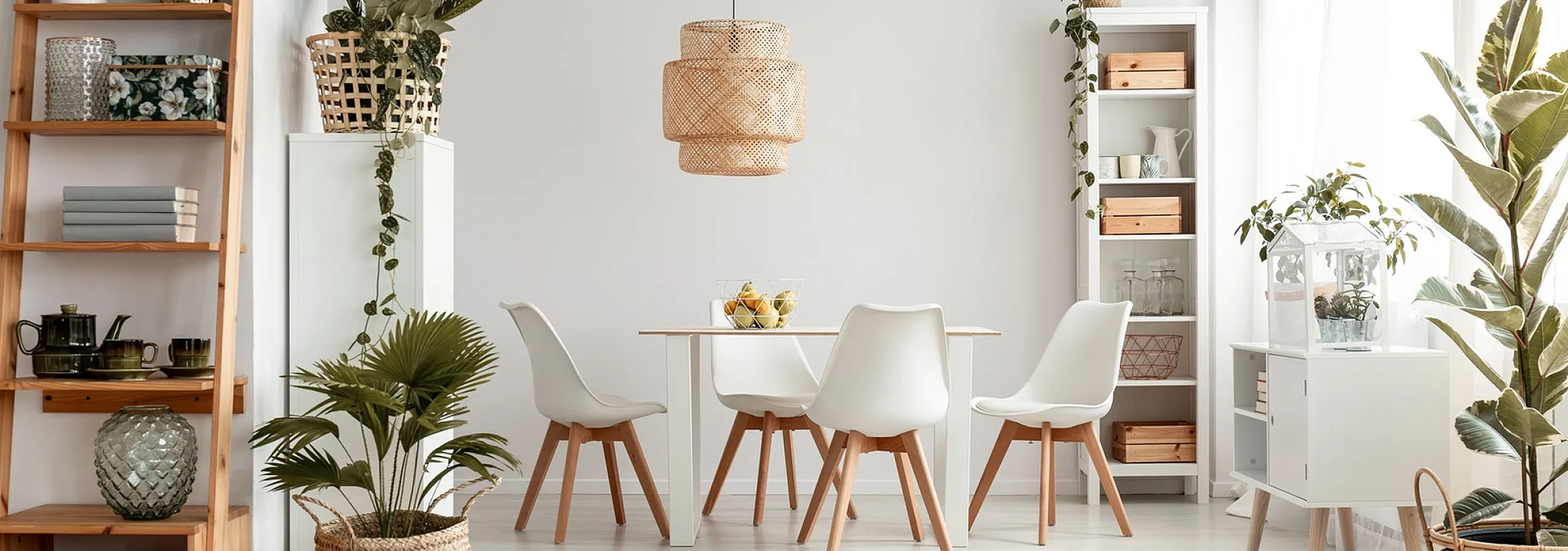 dining area with square table and white chairs