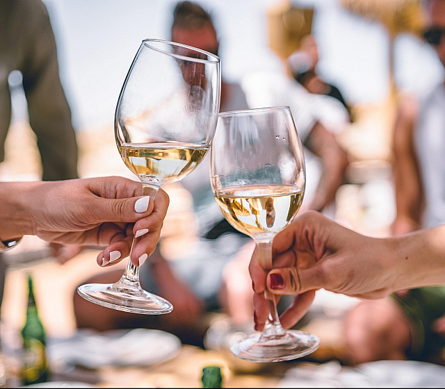 toasting with wine glasses