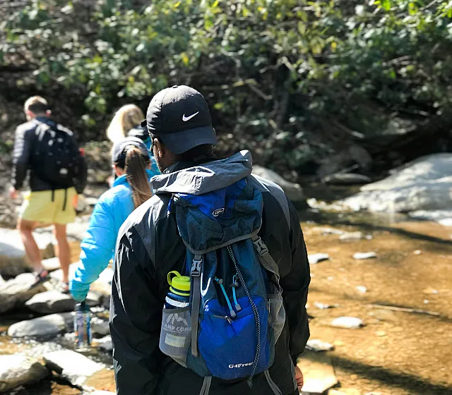 people going for a hike in the woods