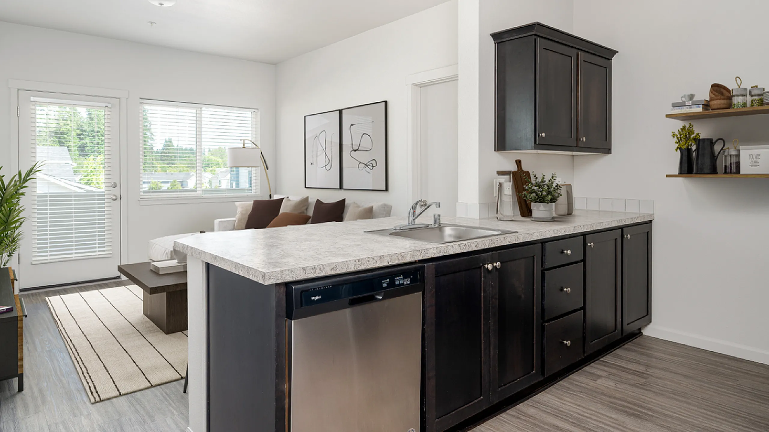 kitchen with vinyl wood like flooring and stainless steel appliances at alderbrook