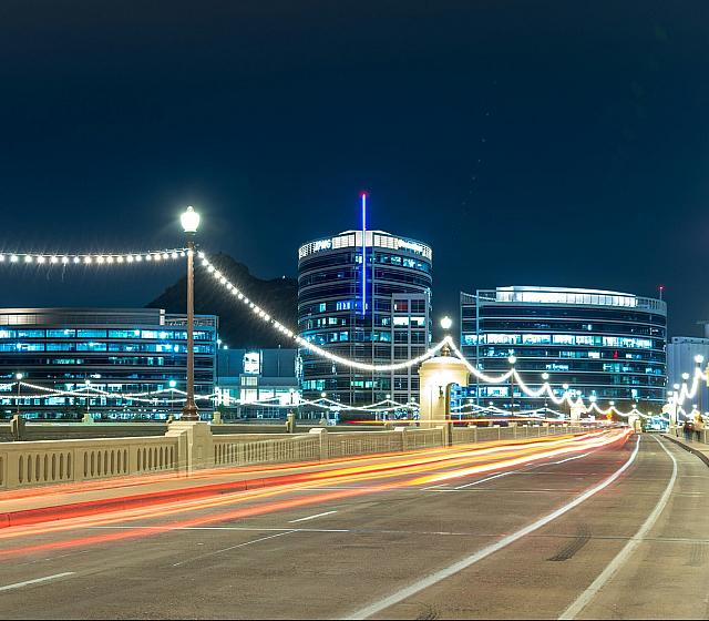 old mill ave bridge at night time with lights