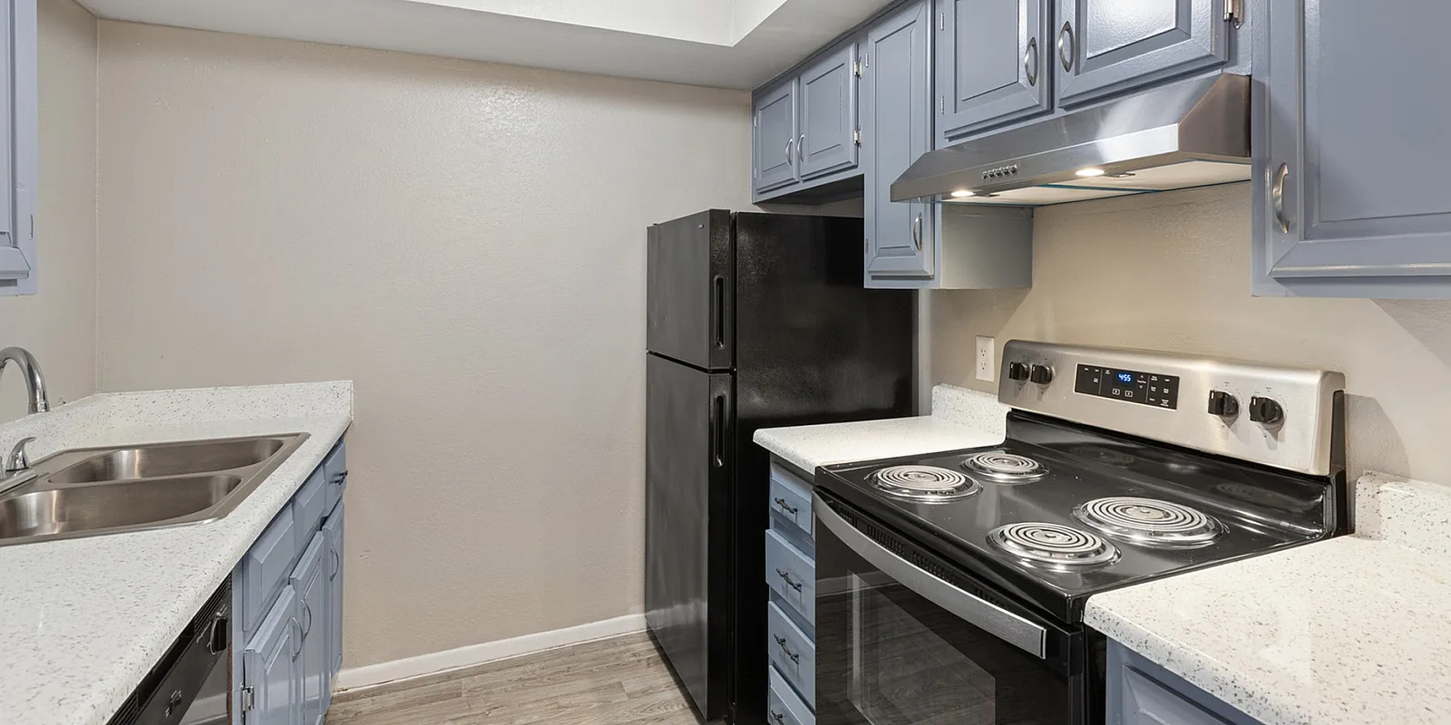 kitchen with vinyl wood like flooring at copper canyon
