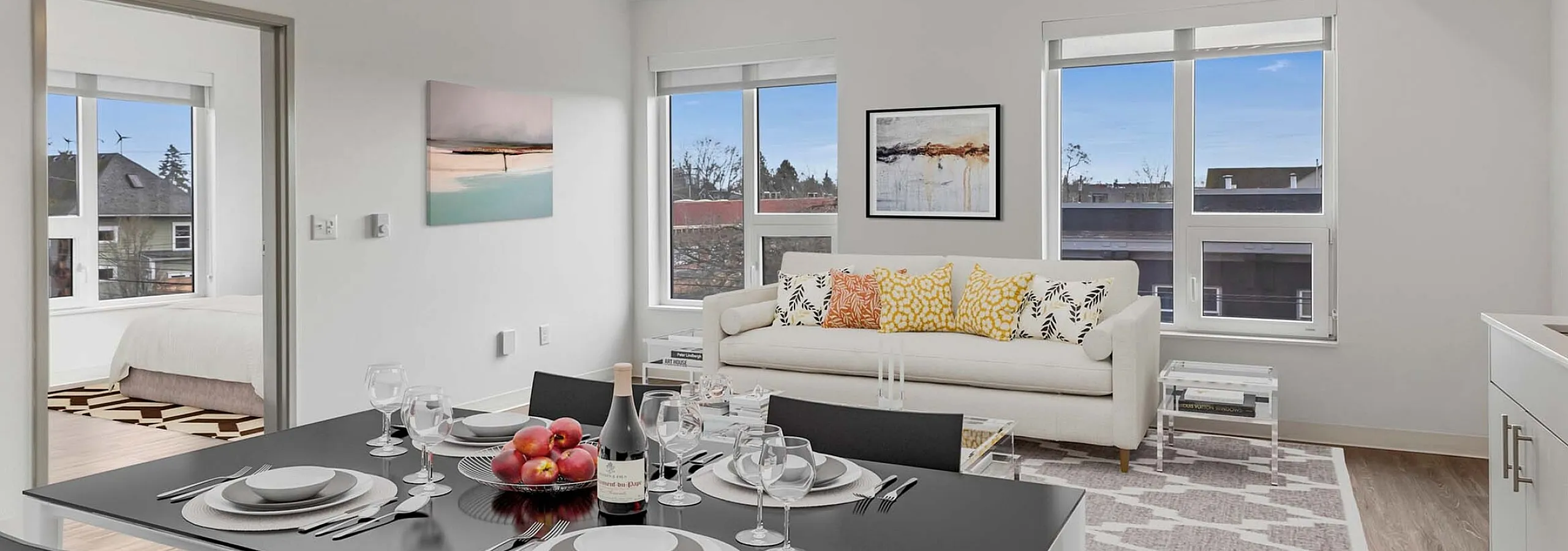 Modern living and dining space at Koz on N. Killingsworth apartments.