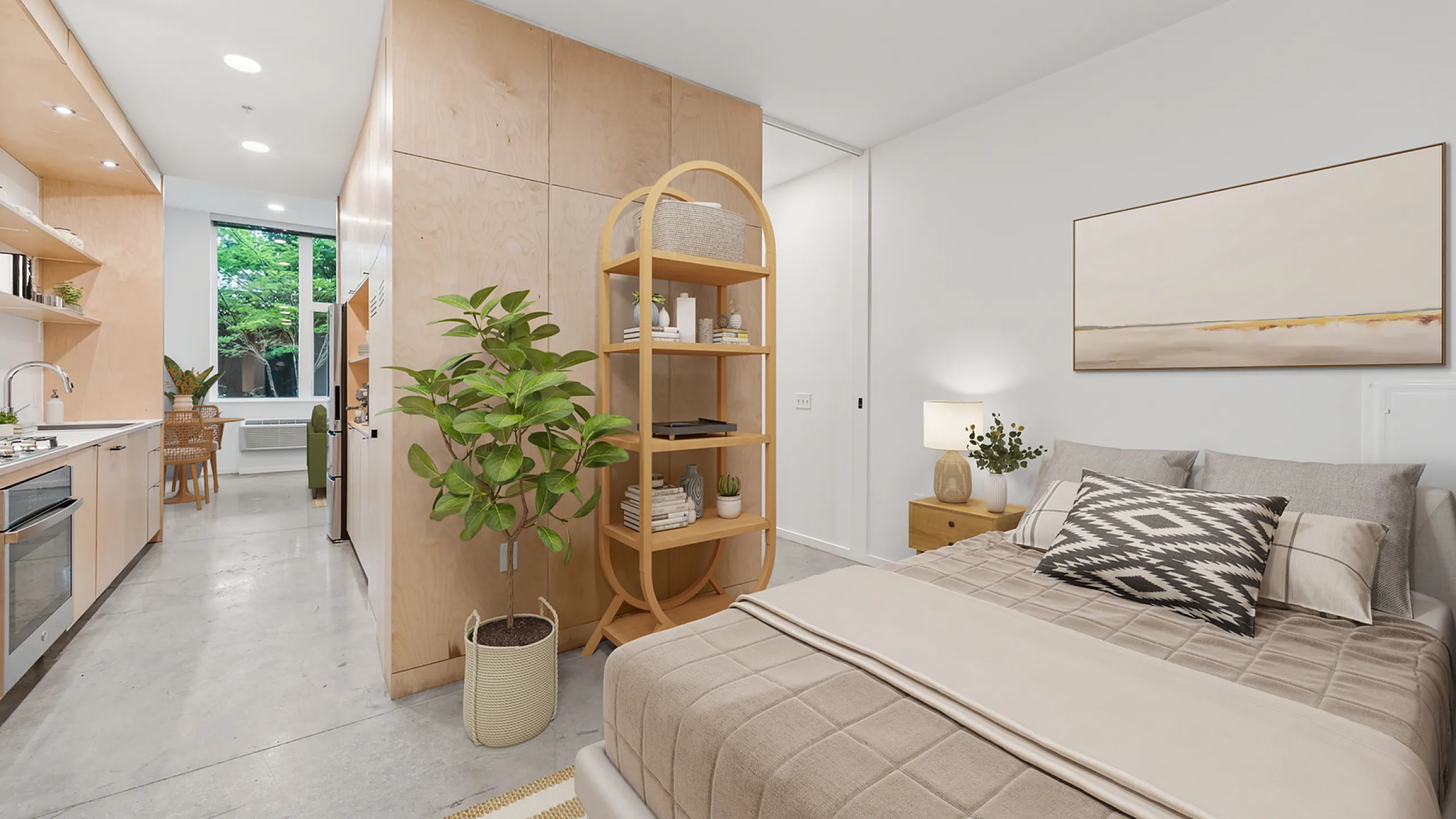 bedroom with bed bookshelf and art