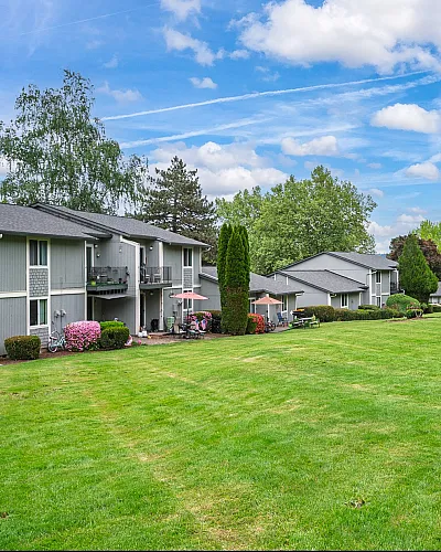 units with greenery and sky