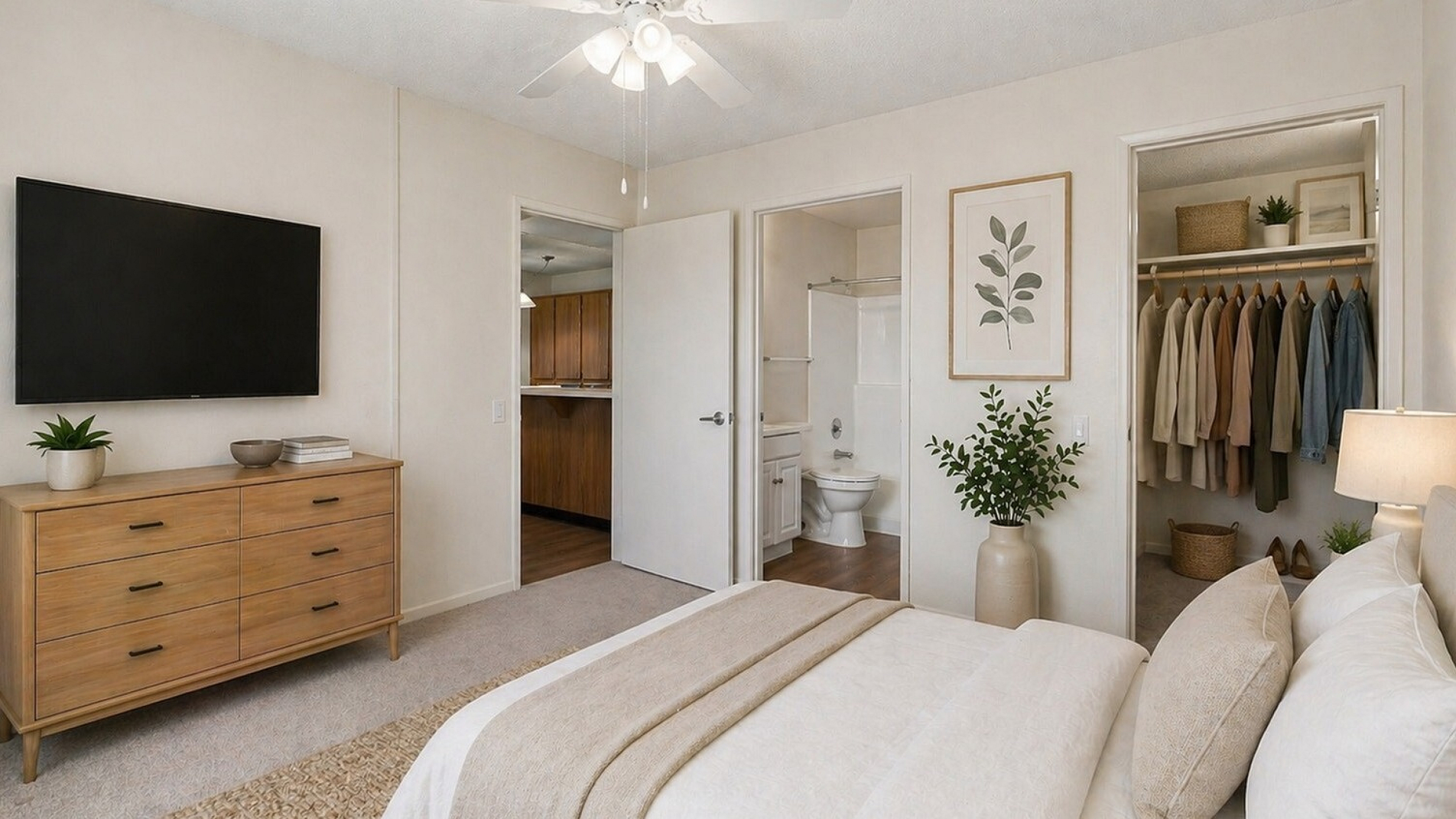 virtually staged bedroom with closet and ceiling fan at orchard mesa