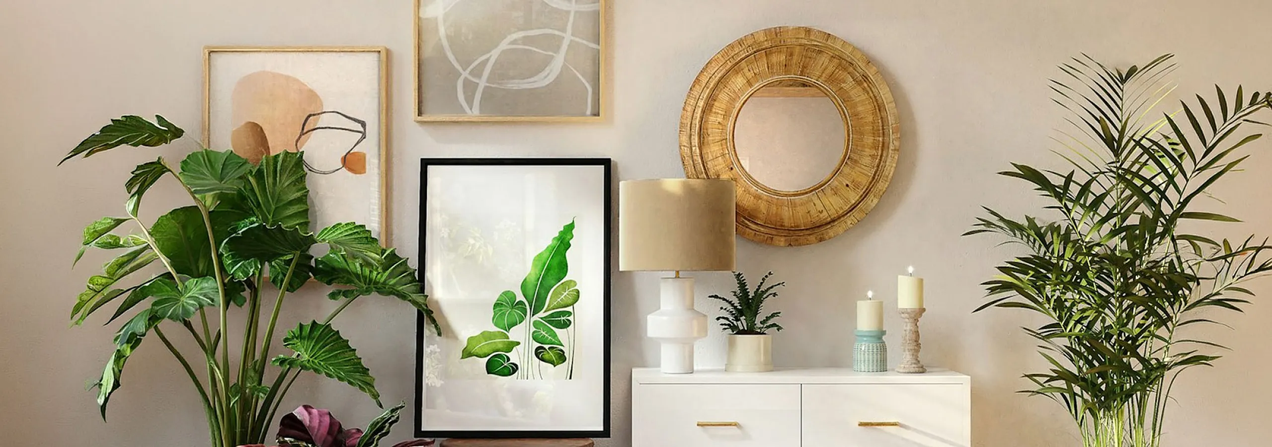 gallery wall and console with decorative items and plants to the sides