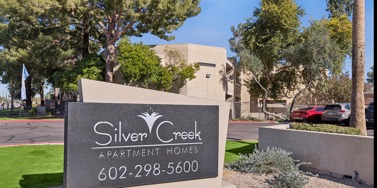 silver creek apartments monument sign at night