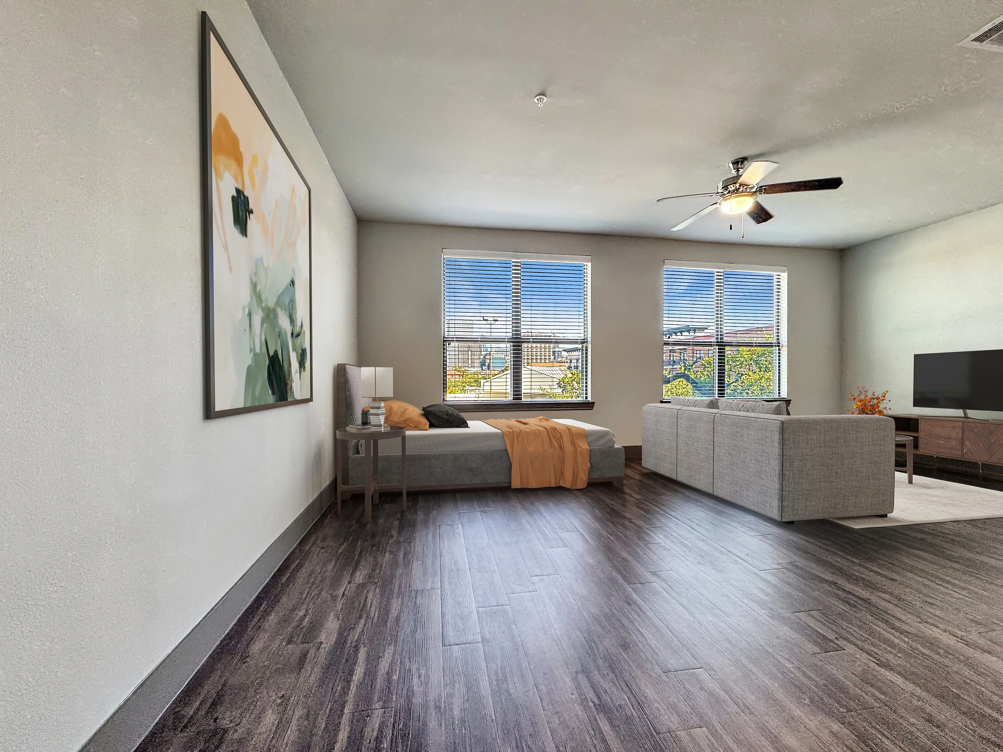 Bright and airy living space with modern furnishings, large windows, and elegant wooden flooring, perfect for relaxation and entertainment.
