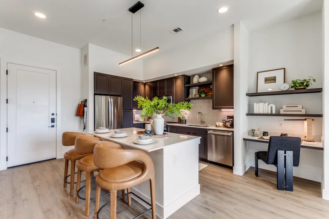 Pearl Bee Cave | Bee Cave, Texas | chic modern kitchen with built in office space