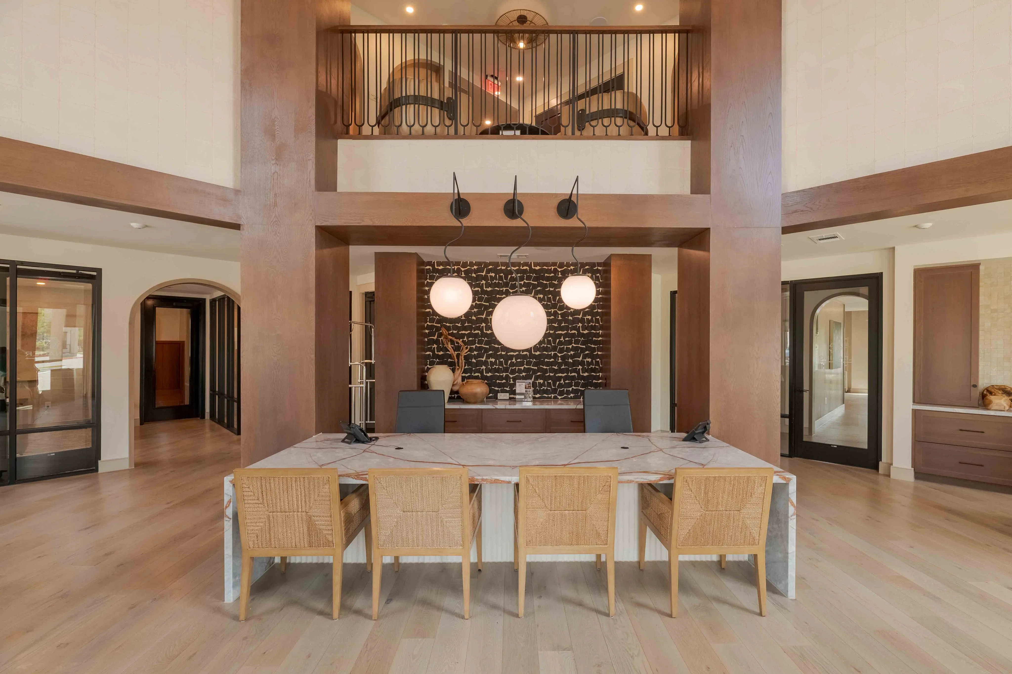 Luxurious office space with elegant decor, stylish wooden accents, and modern lighting, perfect for a productive work environment.