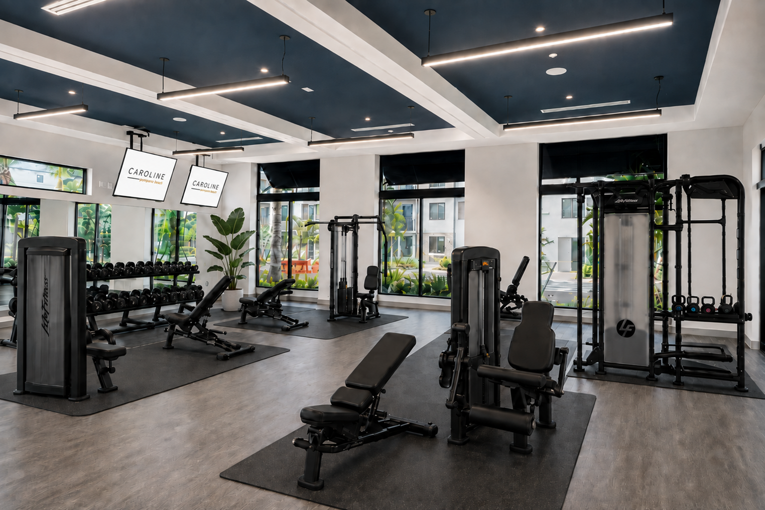 Modern fitness center with state-of-the-art equipment, sleek design, and abundant natural light.