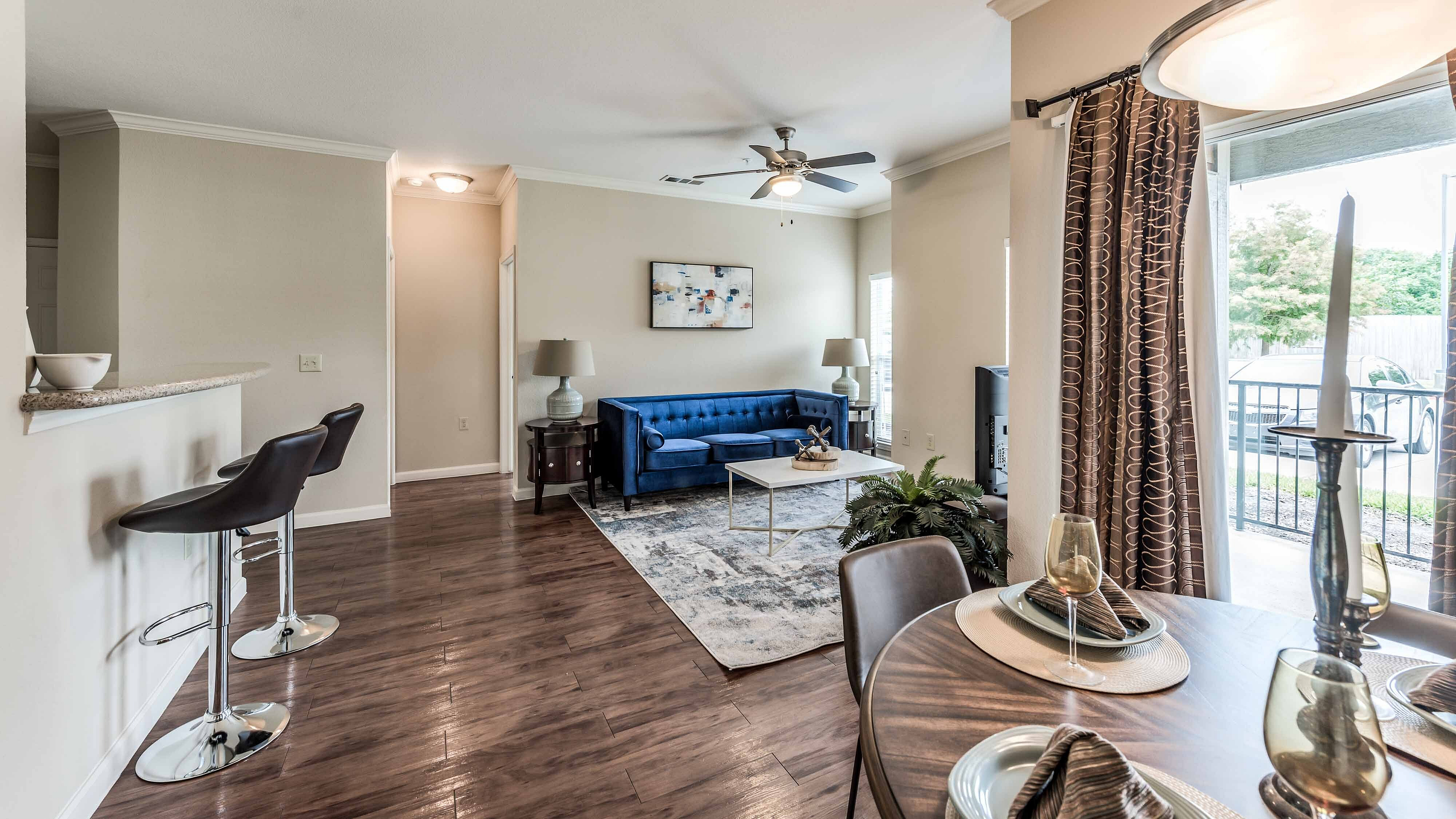 Apartment dining area with adjacent kitchen at Bennett Baytown