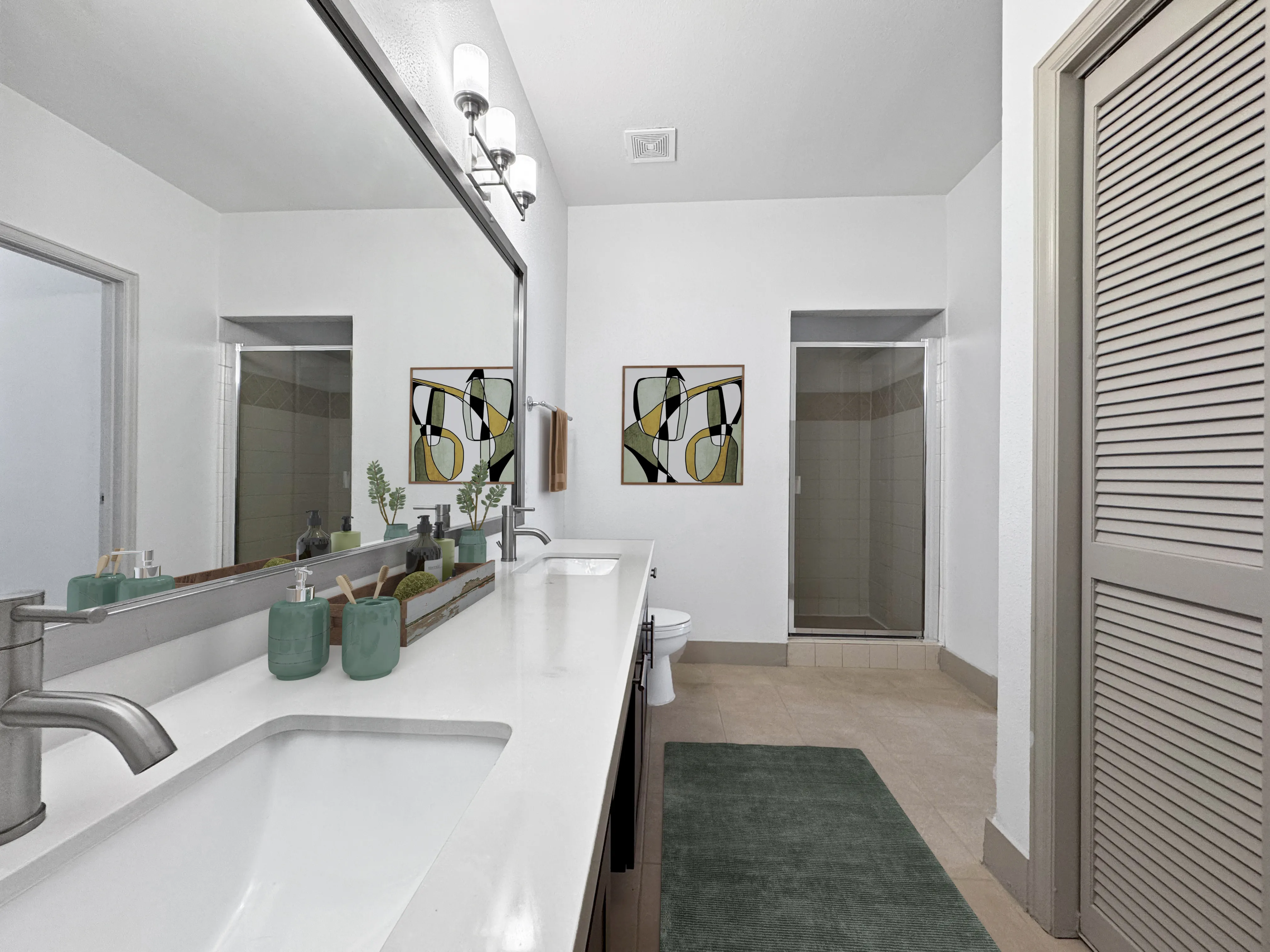 Elegant bathroom with a large mirror, double sink vanity, and modern walk-in shower.