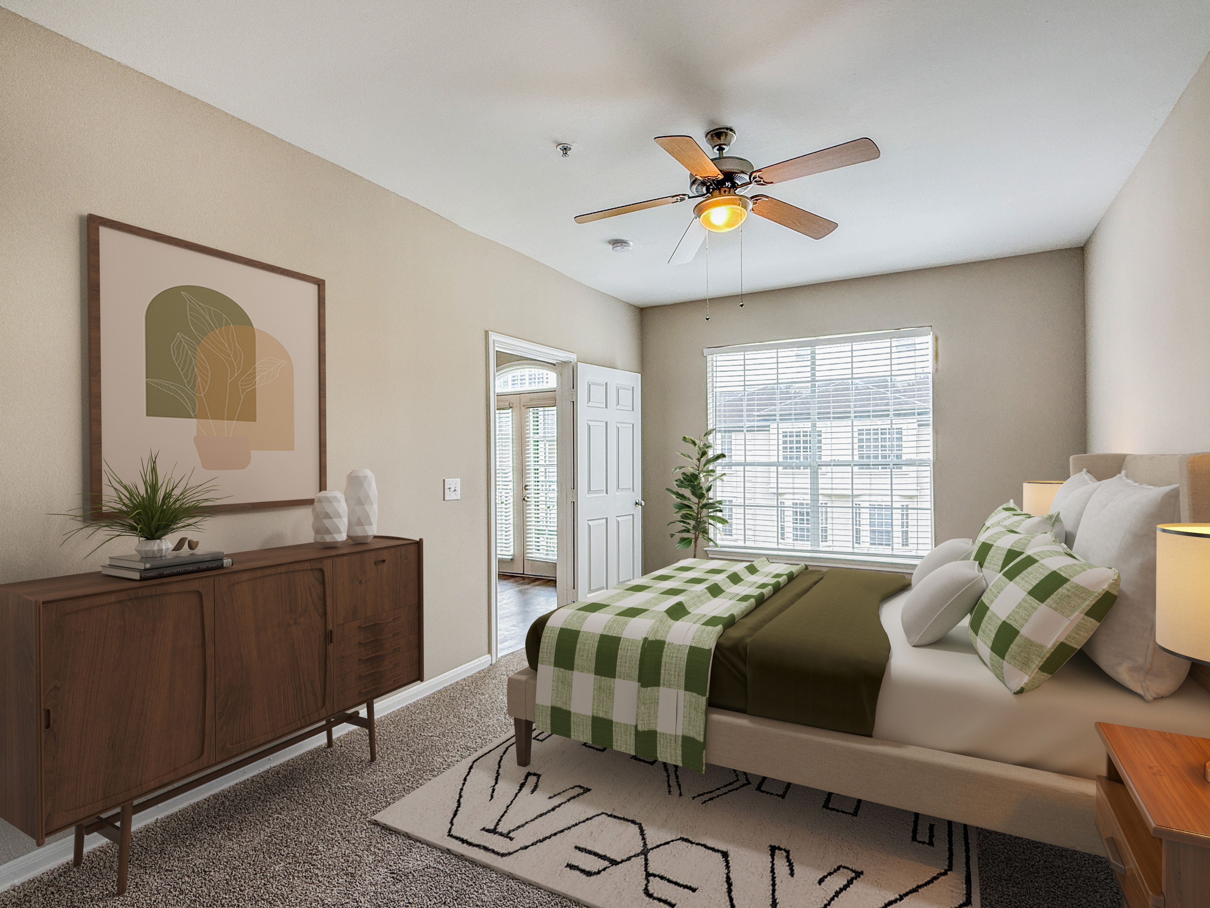 Modern bedroom featuring elegant furniture, stylish decor, and abundant natural light from large windows.