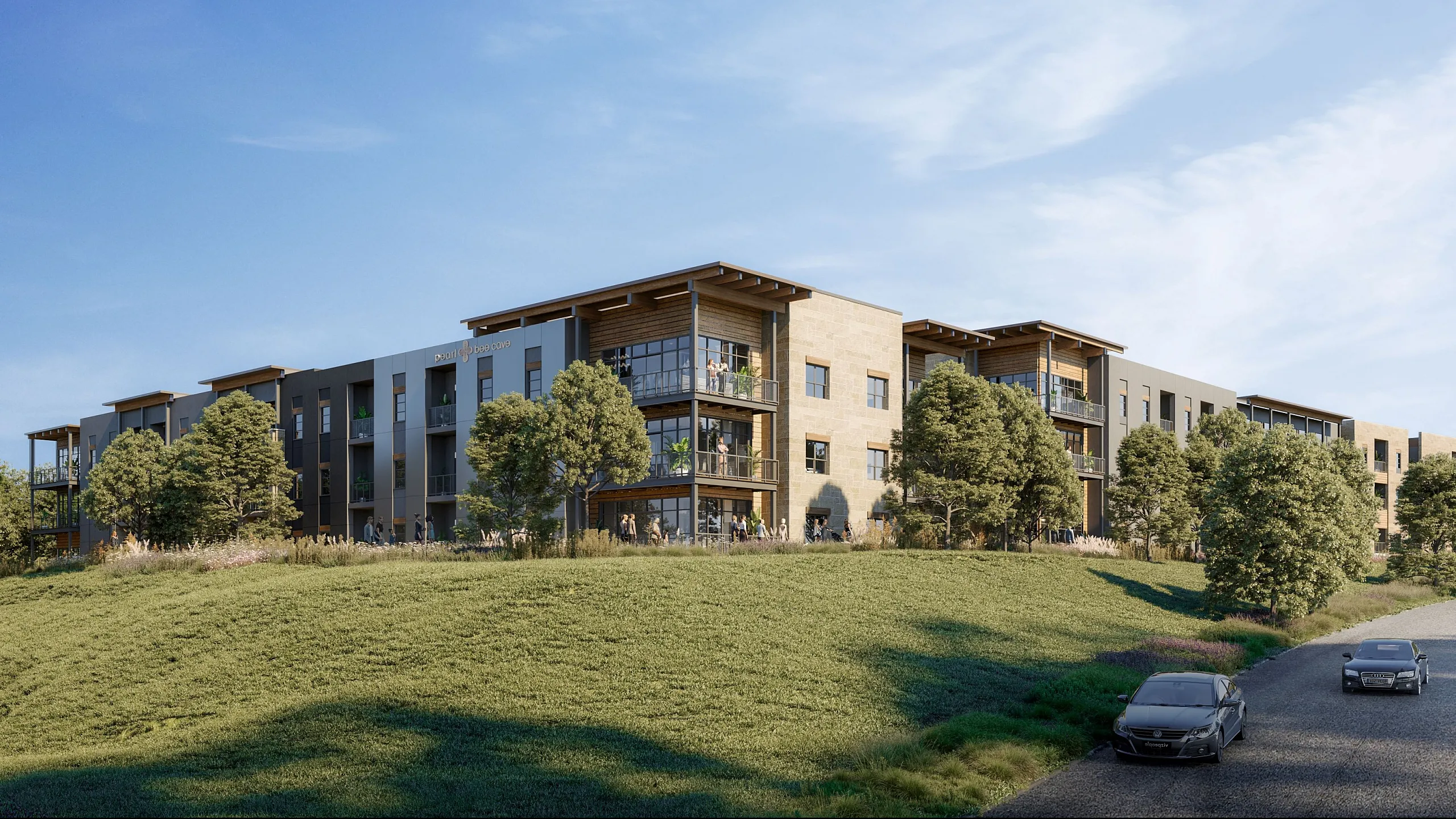Modern apartment complex surrounded by lush greenery, offering spacious balconies and contemporary architecture under a clear blue sky.
