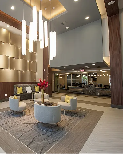 Luxurious lobby with elegant lighting, modern seating, and sophisticated d&eacute;cor, offering a welcoming atmosphere.