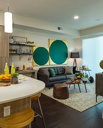 Modern living space with open-concept kitchen, stylish decor, and inviting seating area, perfect for relaxation and entertaining.