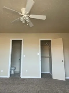 Primary Bedroom with walk-in closet and private bathroom