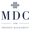 Elegant MDC Property Management logo showcasing sophisticated design since 1948.