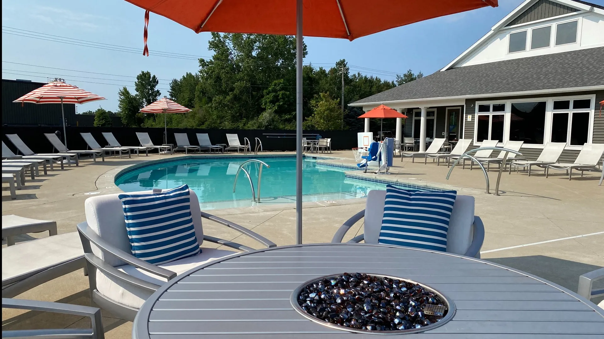 Piper Lakes Fire Table with Pool in Background