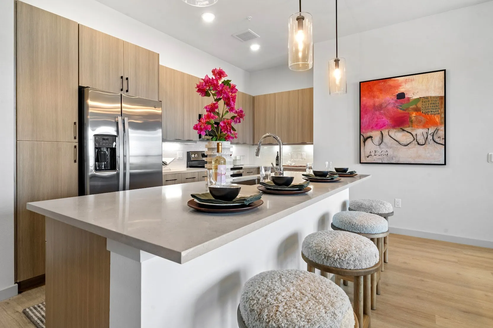 Woodruff B Kitchen with large island and energy efficient stainless steel appliances including a dishwasher