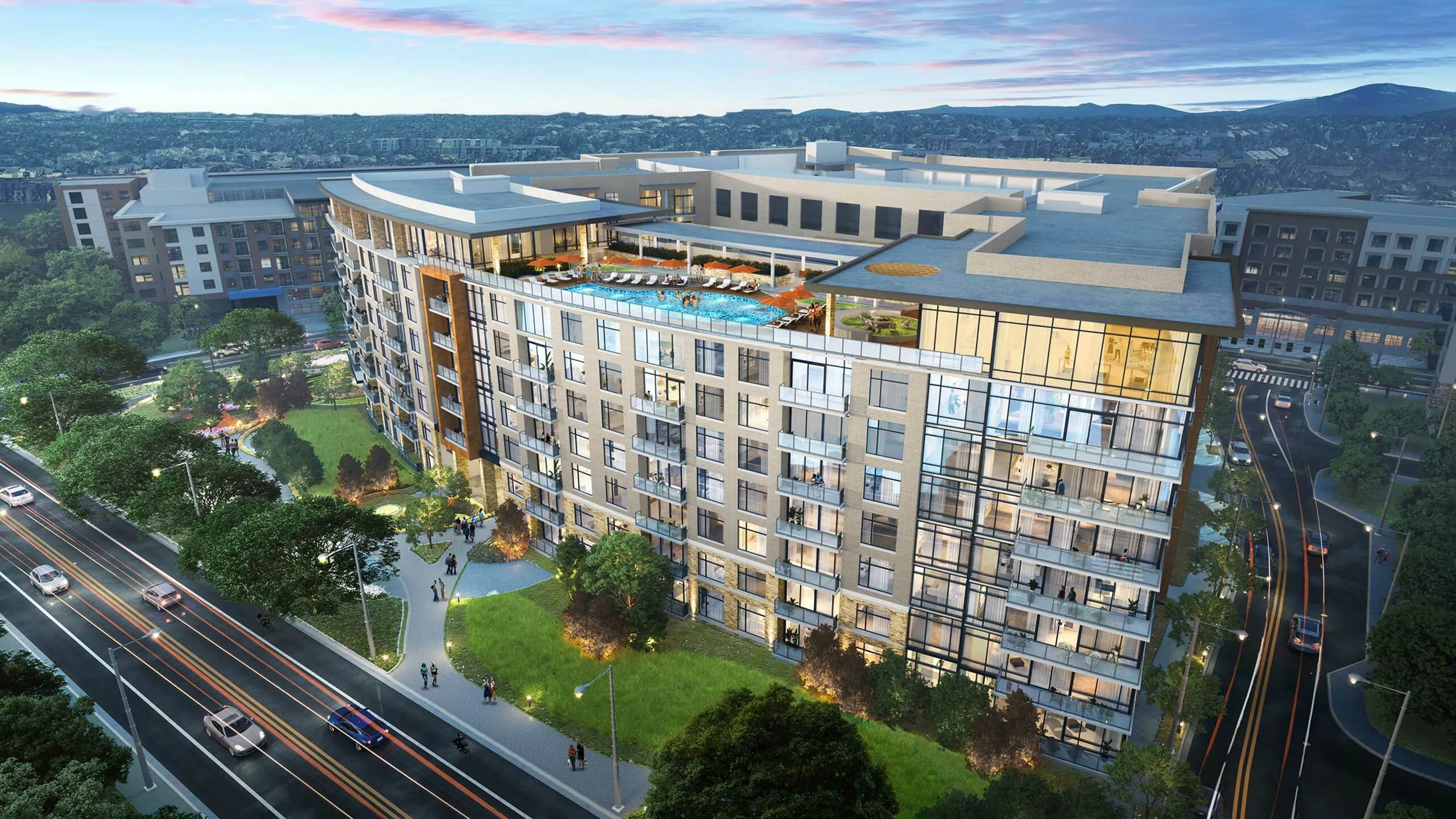Luxurious apartment complex with modern design, rooftop pool, and lush green surroundings against a scenic sunset backdrop.